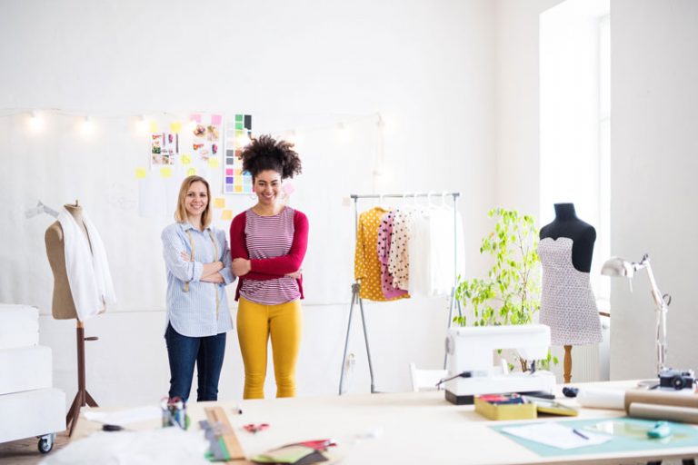 Employer & Employee standing together