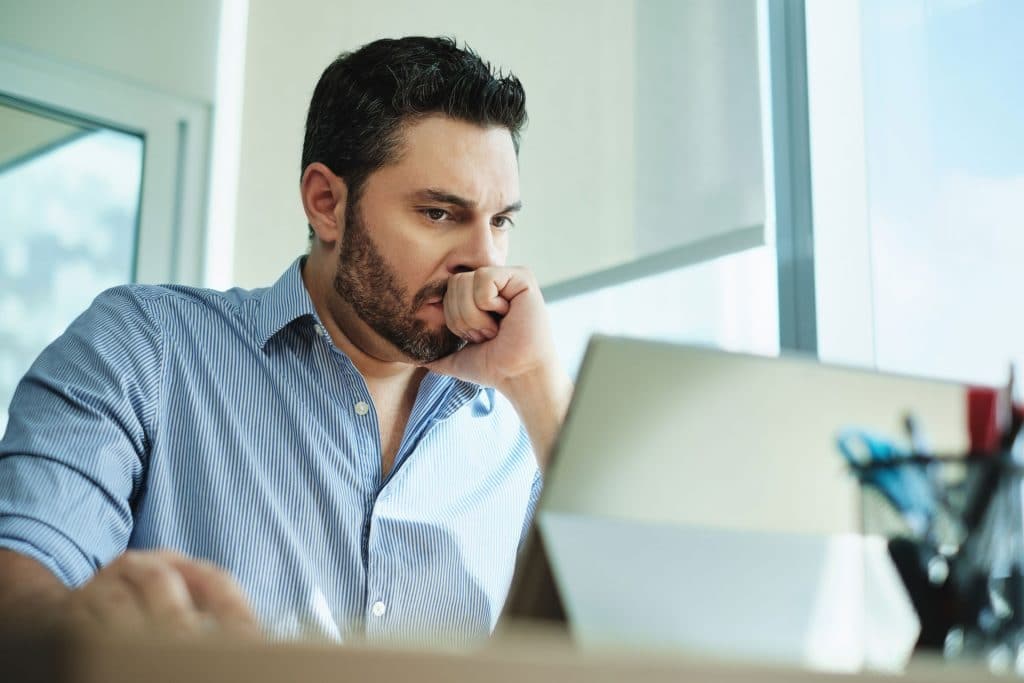Worried man anxious about work