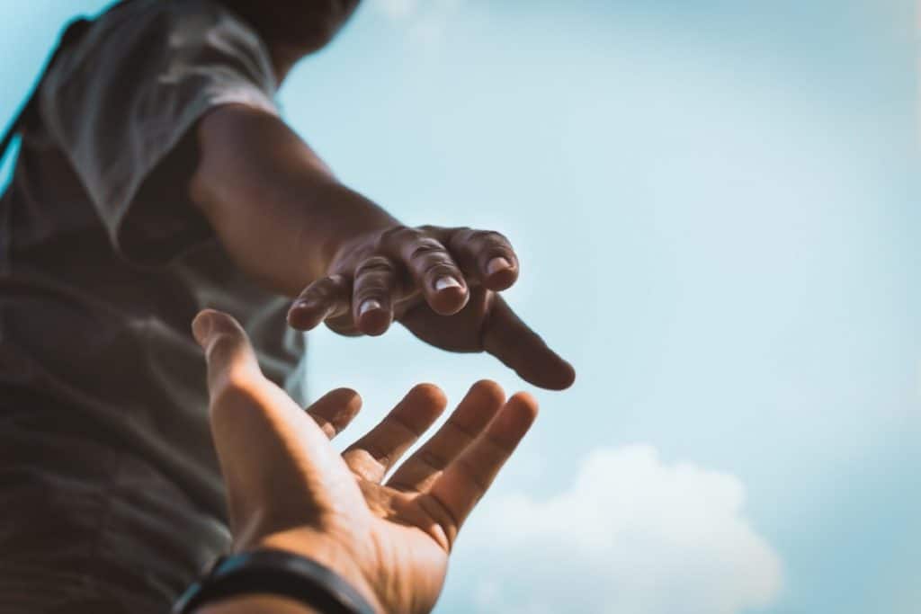 Hand reaching out to help
