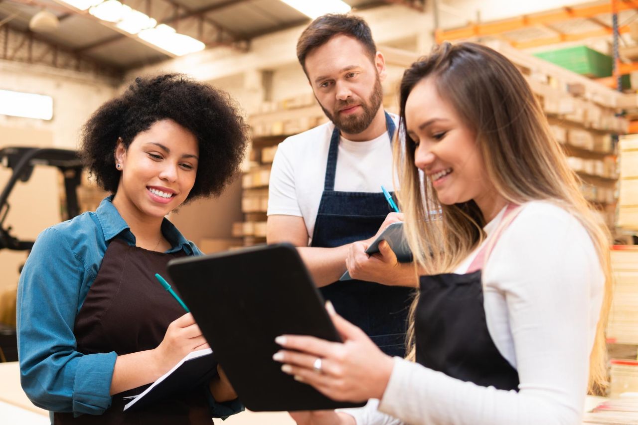 Team of people working at warehouse